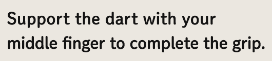 Support the dart with your middle finger to complete the grip.